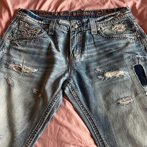 Rock Revival Men Light blue with cream and orange stitching Jean size 38